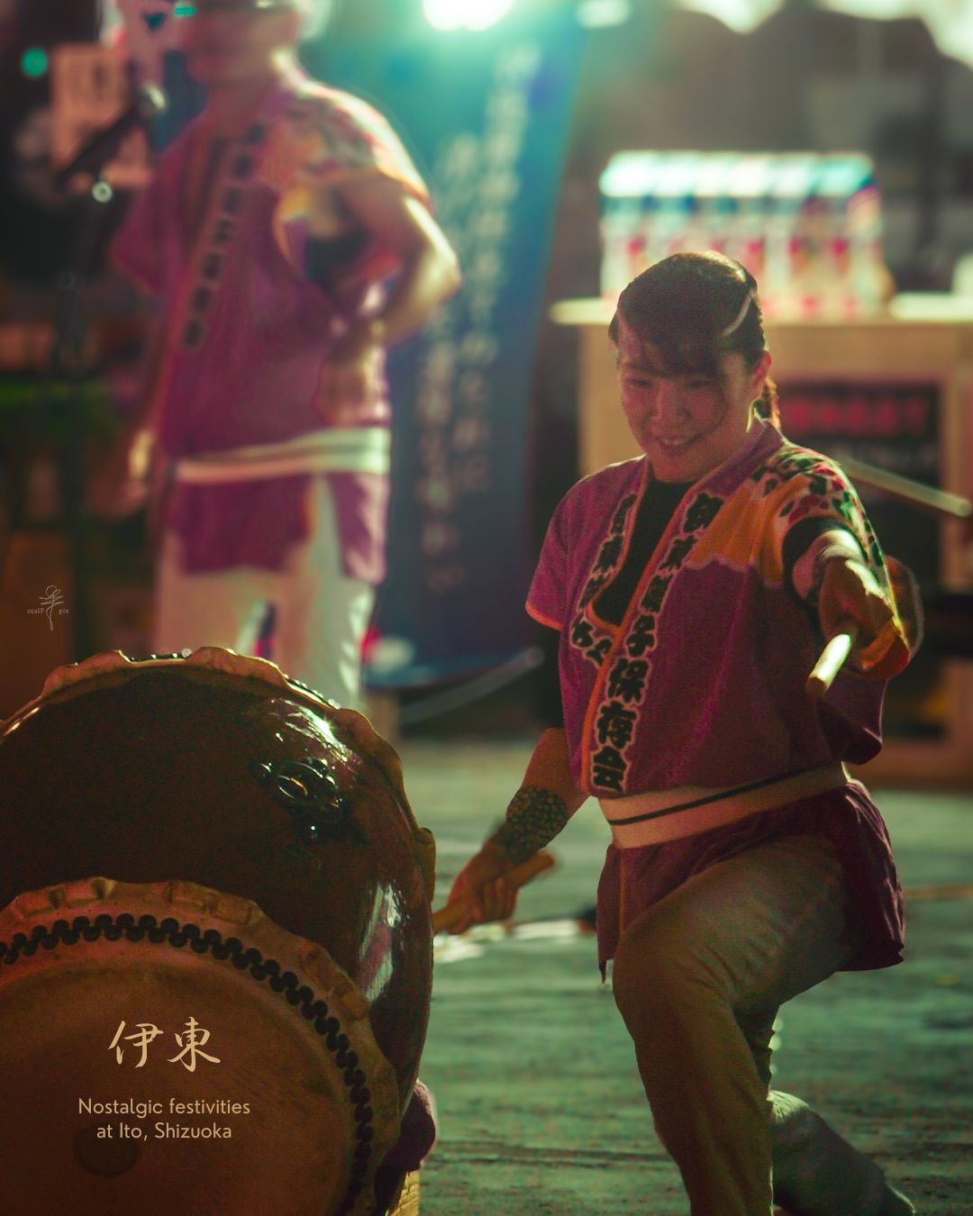 Taiko drummer performing at a summer festival in Ito
